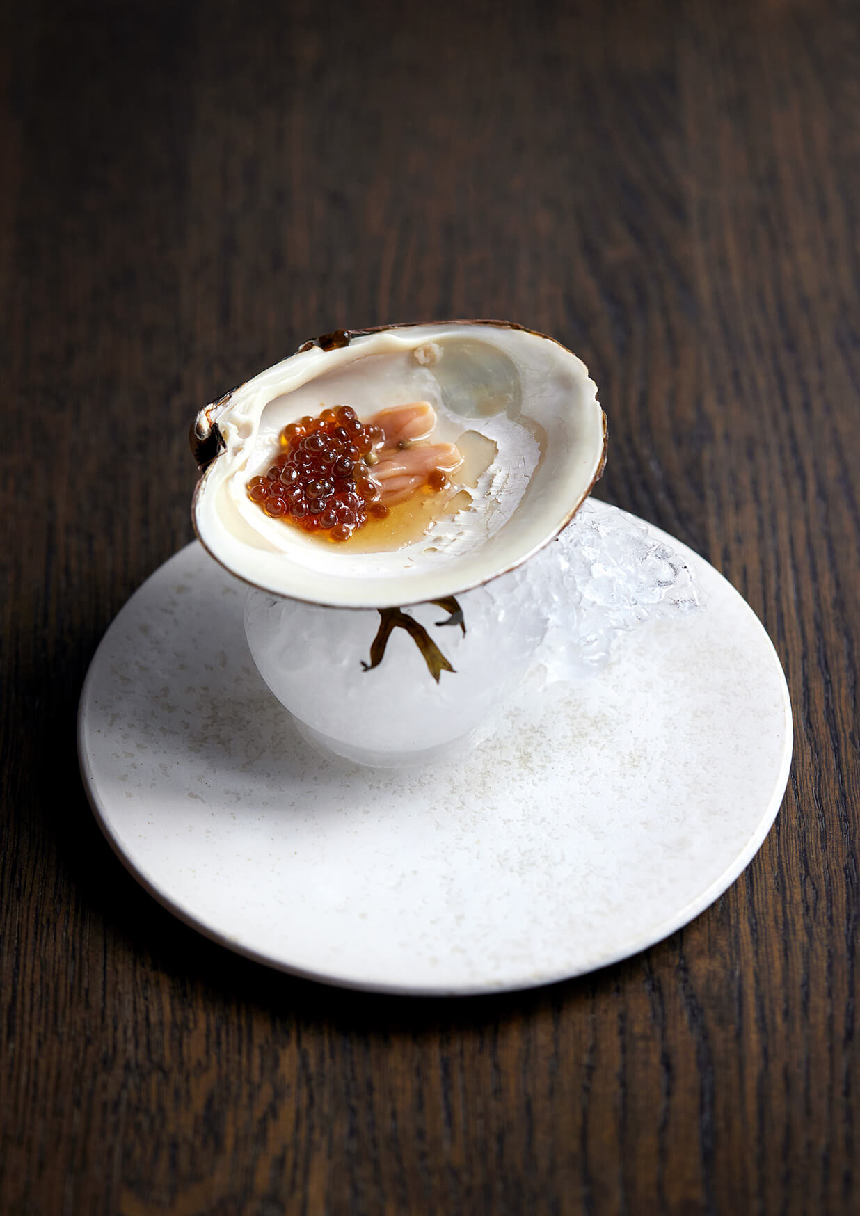 Brown venus clam with soy pearls at Restaurant STUDIO in Copenhagen